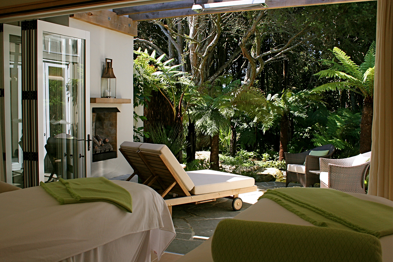 Kauri Cliffs Spa massage rooms amongst the lush native plantings