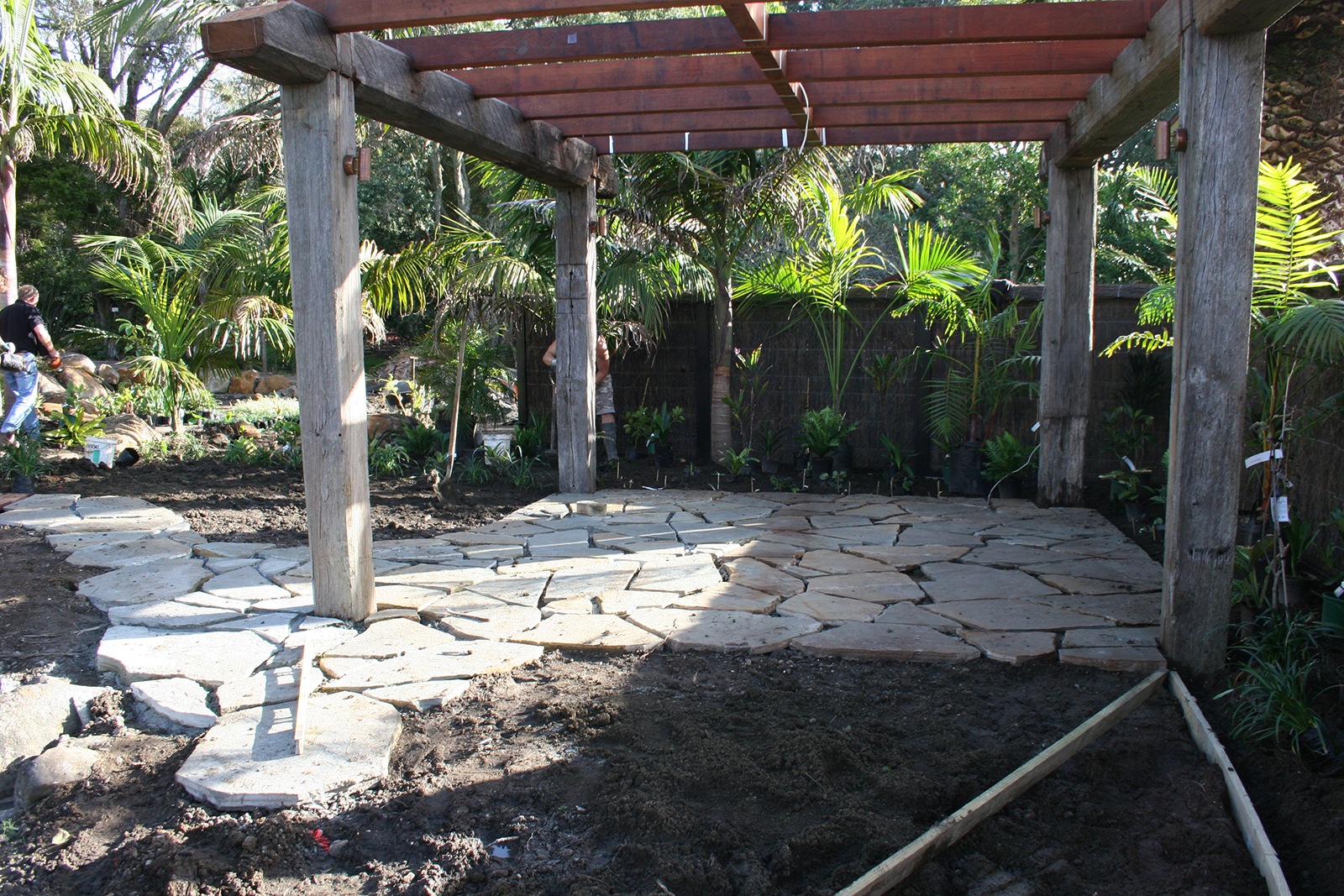 laying down the outdoor seating area stones