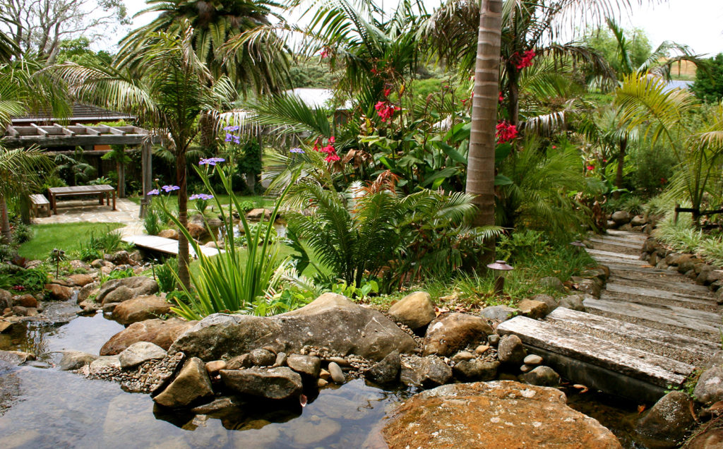 railway sleeper steps and pond at sanctuary in the cove